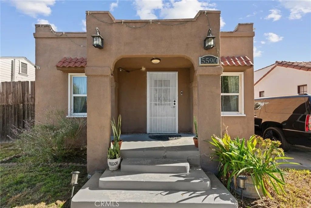 Photo of 5590 Lewis Ave, Long Beach, CA 90805 (MLS # SB25257589)