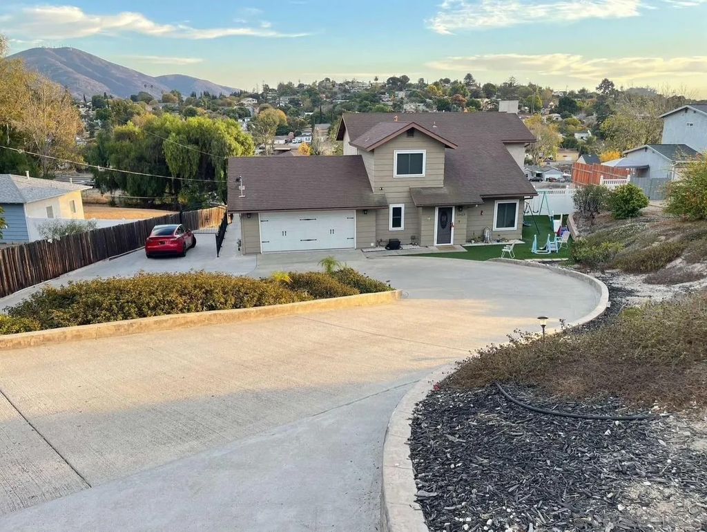 Photo of 10423 Madrid Way, Spring Valley, CA 91977 (MLS # 260011262)