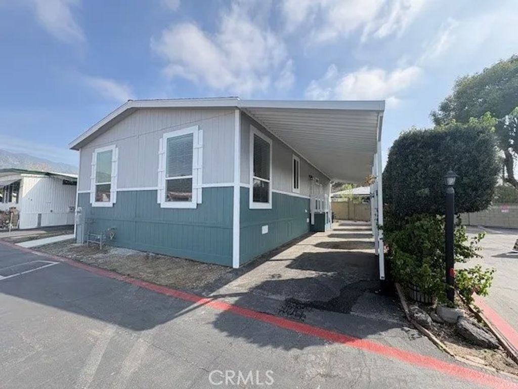 Photo of 208 S Barranca Ave #13, Glendora, CA 91741 (MLS # HD26040016)