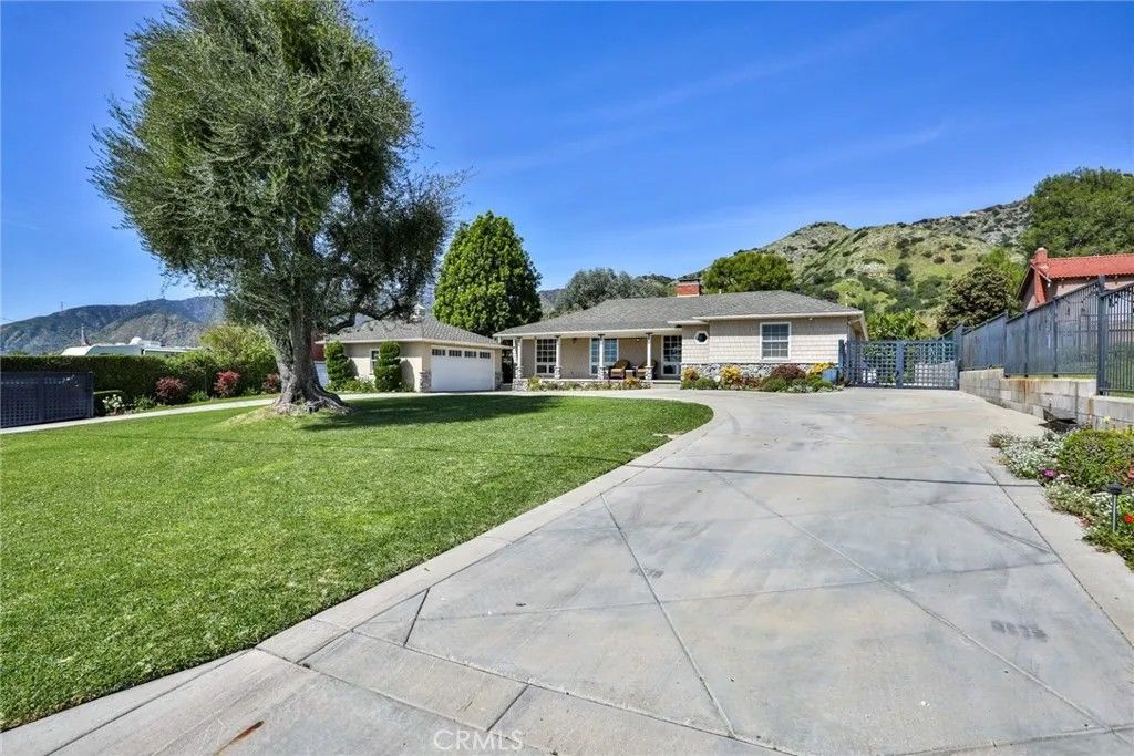 Photo of 579 E Sierra Madre Ave, Azusa, CA 91702 (MLS # DW26059530)