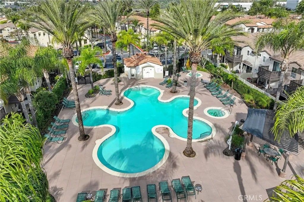 Photo of 30345 Buccaneer Bay Ln, Murrieta, CA 92563 (MLS # SW26005192)