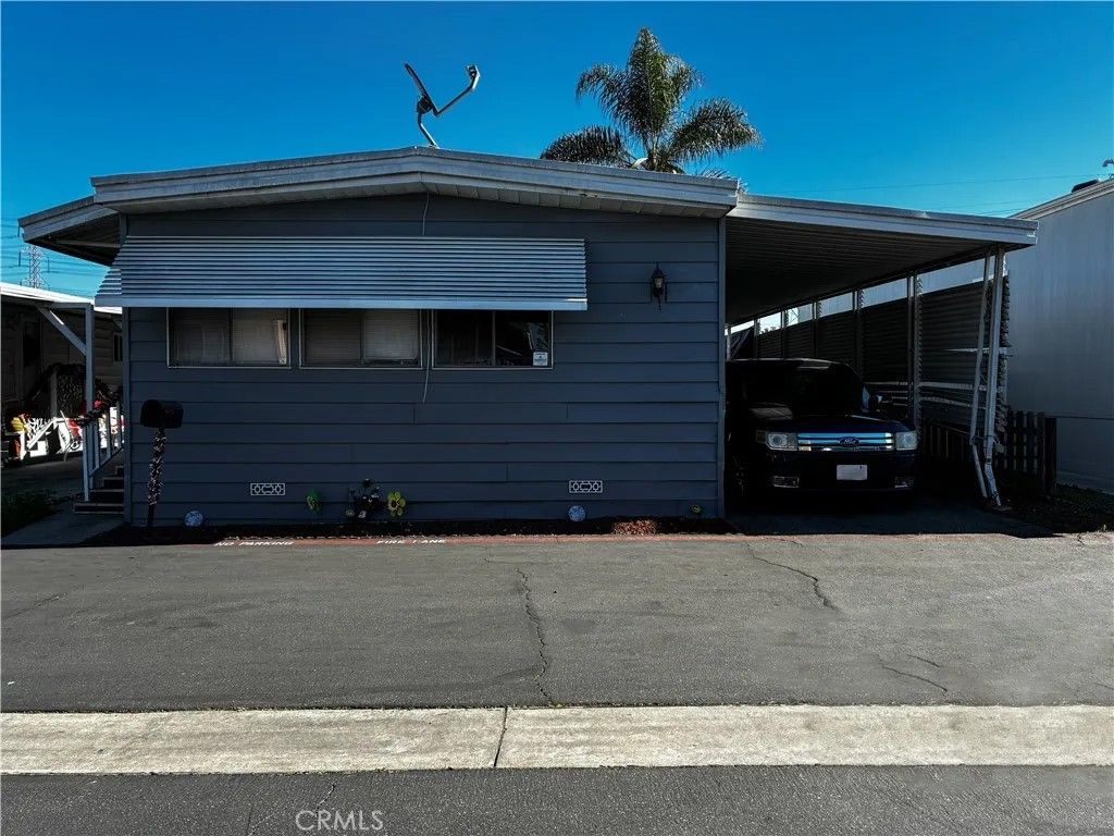 Photo of 16600 Orange Ave #66, Paramount, CA 90723 (MLS # RS26009530)