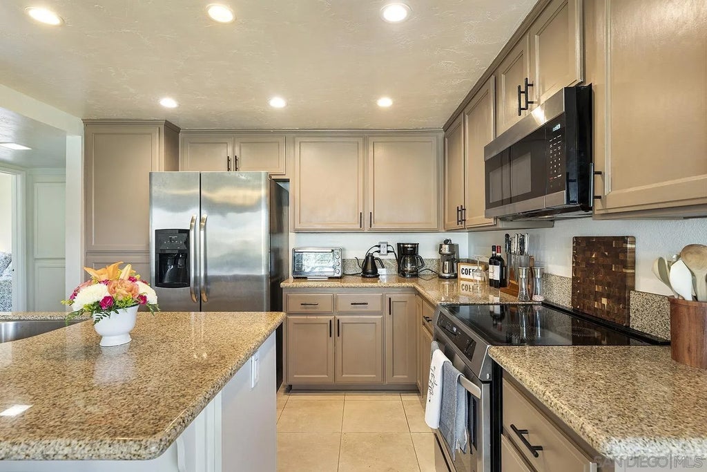 Photo of 355 N Melrose Dr #E, Vista, CA 92083 (MLS # 260024428)