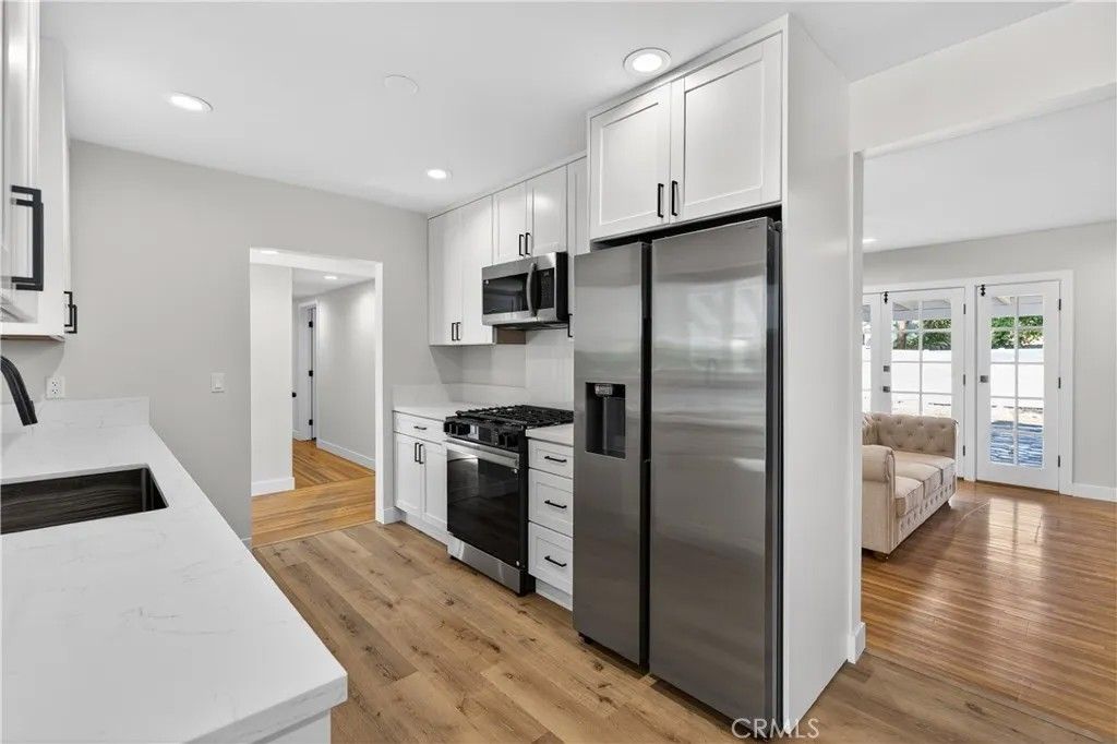 Photo of 8398 Rudnick Ave, West Hills, CA 91304 (MLS # SR26051543)