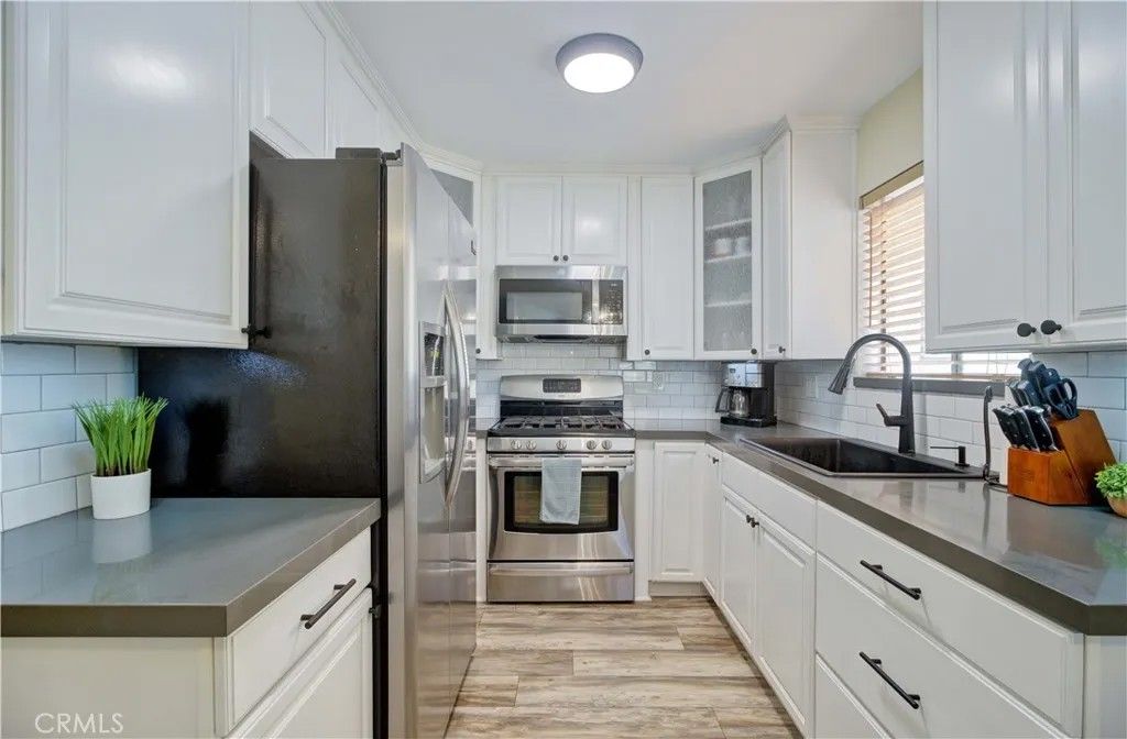 Photo of 4110 Elm Avenue #203, Long Beach, CA 90807 (MLS # PW26072377)