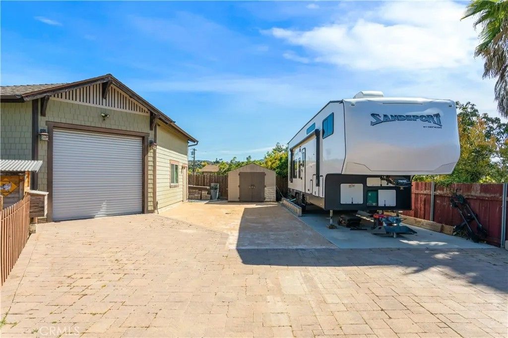 Photo of 1215 Lagan Ave, Vista, CA 92083 (MLS # ND26058908)