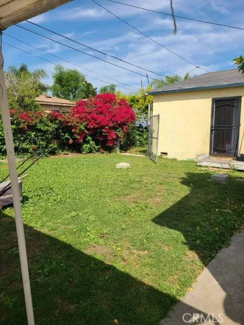 Photo of 1313 S Broadacres Ave, Compton, CA 90220 (MLS # DW26084230)