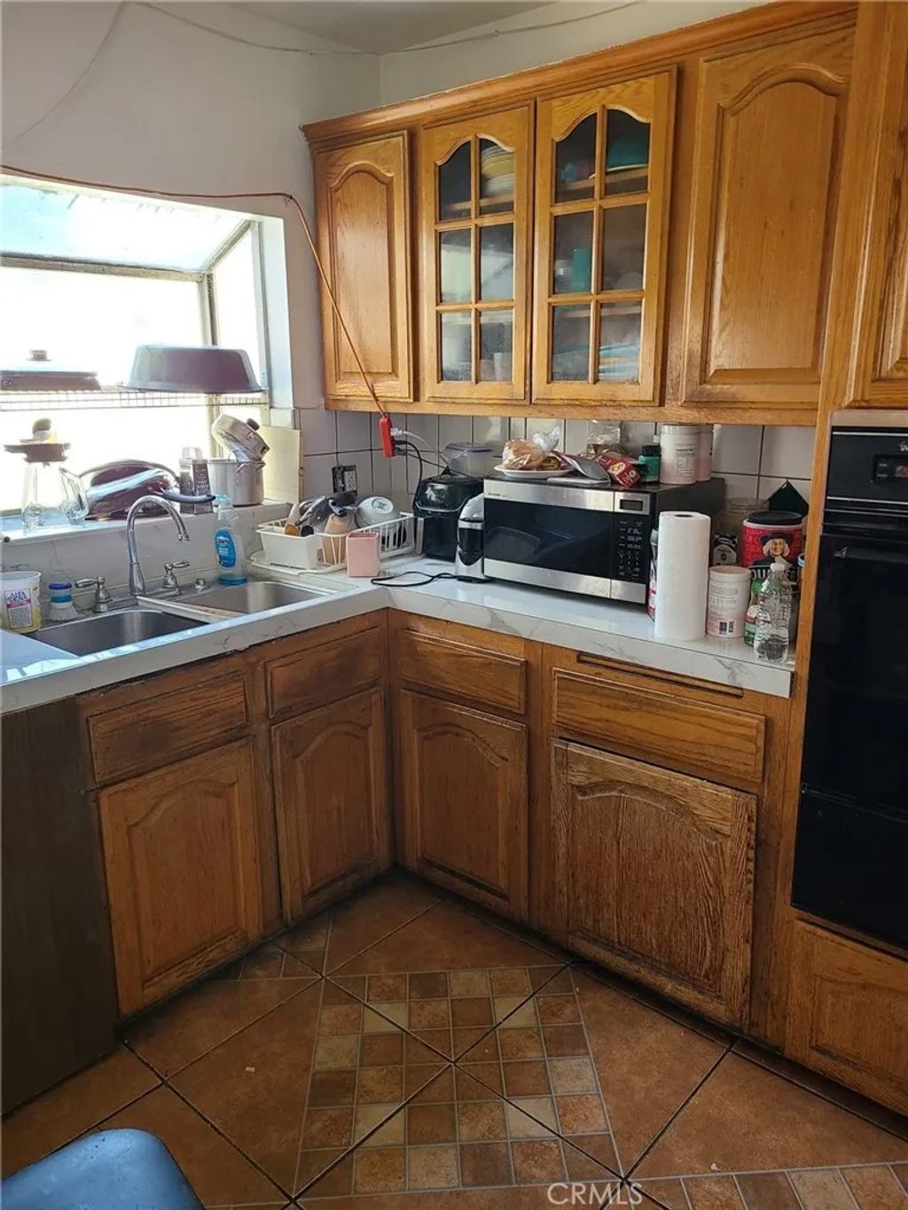 Photo of 1313 S Broadacres Ave, Compton, CA 90220 (MLS # DW26084230)