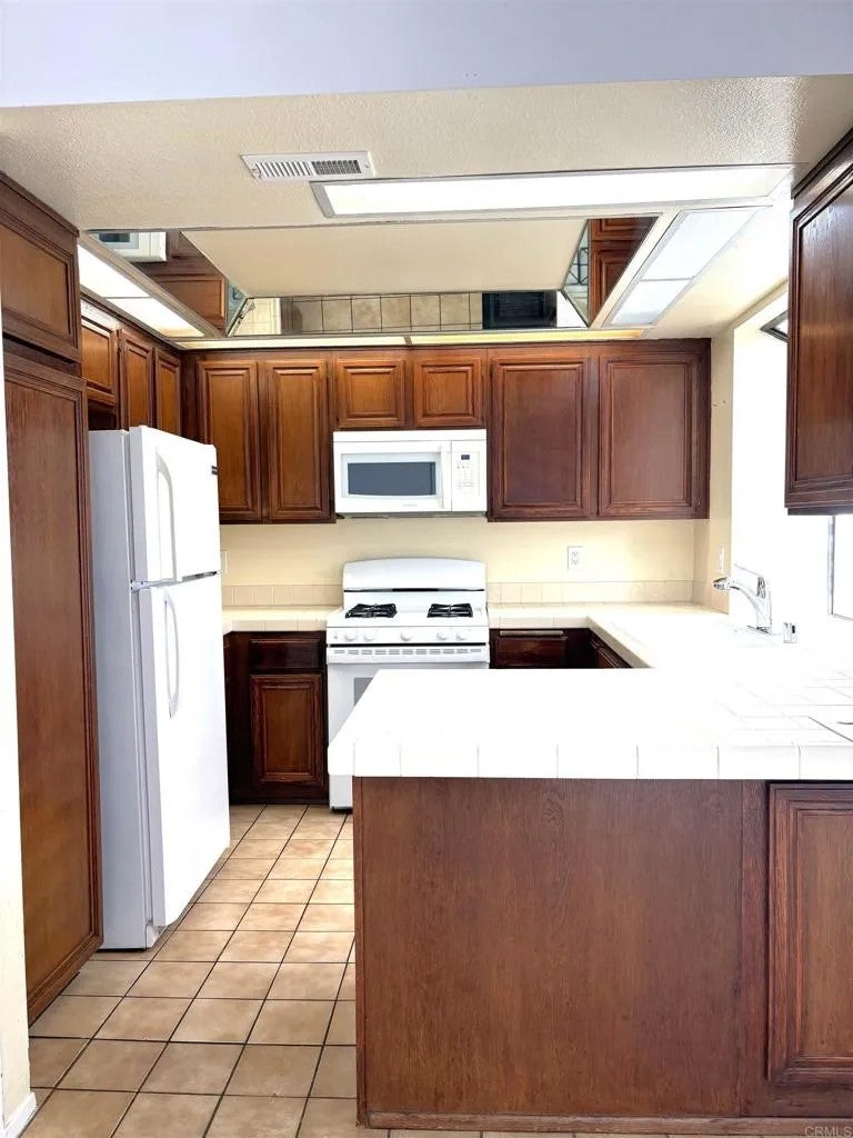 Photo of 6924 Sandpiper Place, Carlsbad, CA 92009 (MLS # NDP2609570)