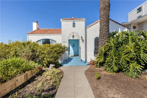 Photo of 1569 S Orange Grove Avenue, Los Angeles, CA 90019 (MLS # SR26220161)