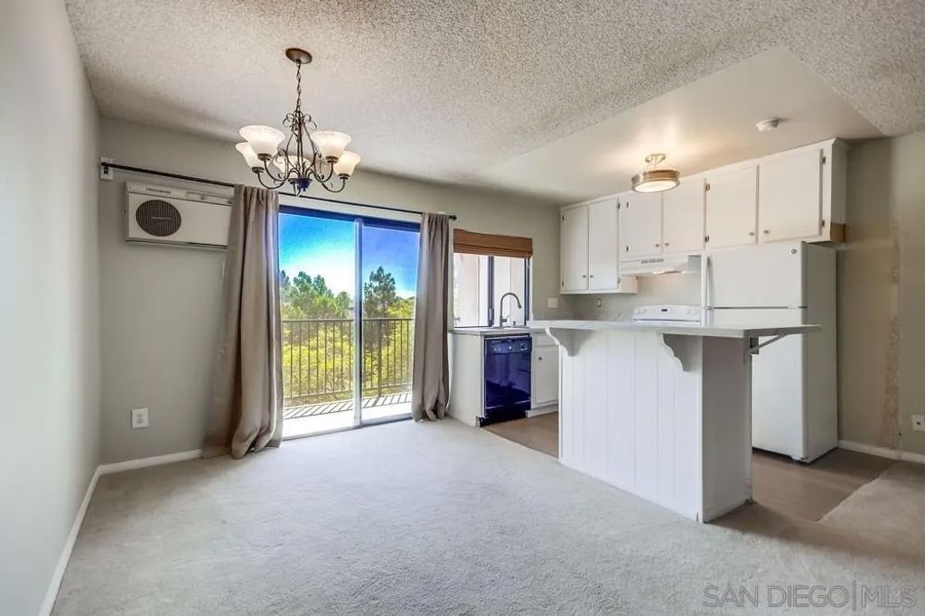 Photo of 7838 Cowles Mountain Ct #C32, San Diego, CA 92119 (MLS # 260007659)