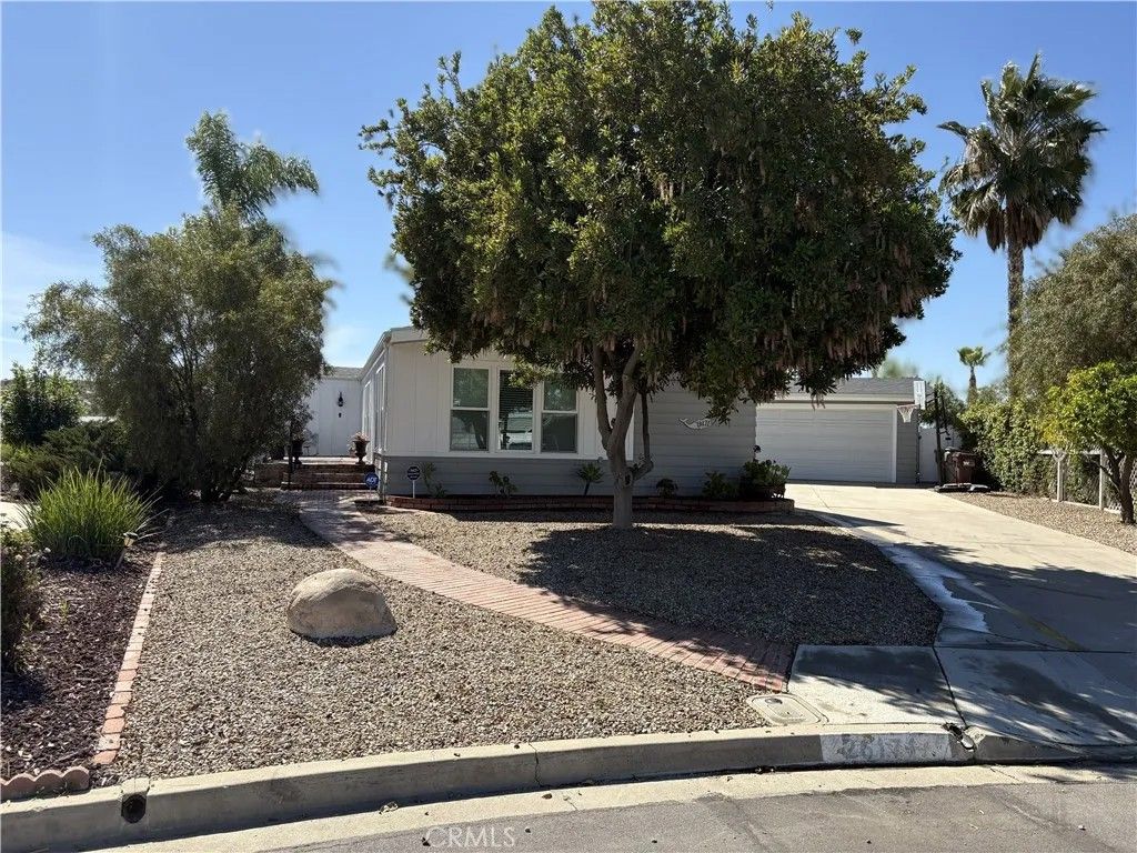 Photo of 26171 Kentia Palm Dr, Homeland, CA 92548 (MLS # PW26057576)