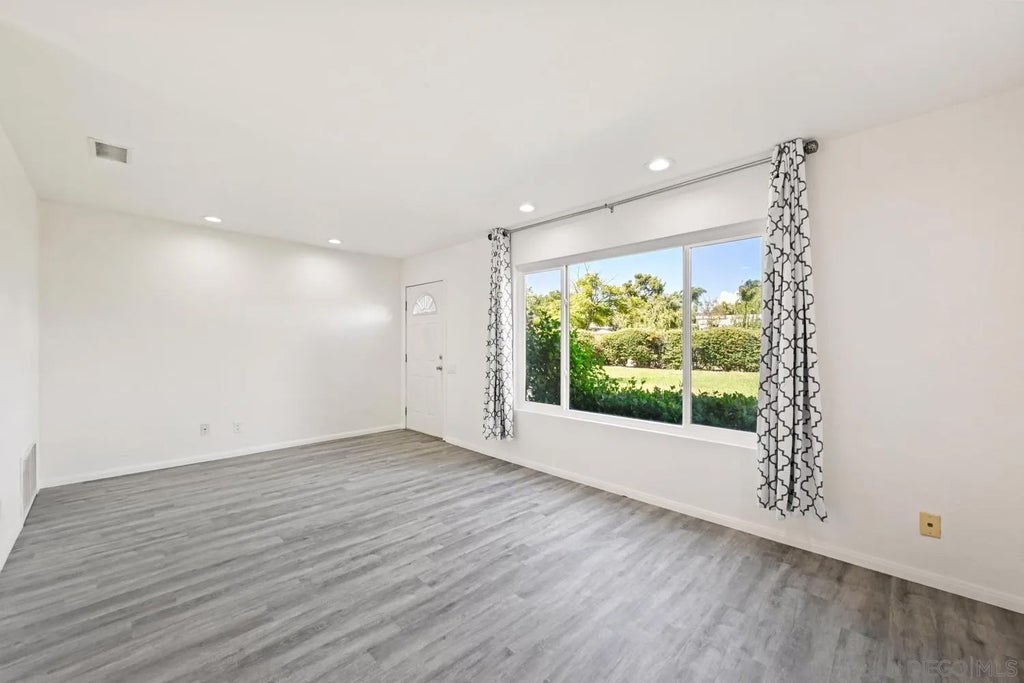 Photo of 9469 Carlton Oaks Dr #A, Santee, CA 92071 (MLS # 260022239)