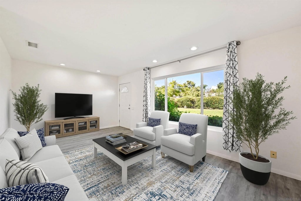 Photo of 9469 Carlton Oaks Dr #A, Santee, CA 92071 (MLS # 260022239)