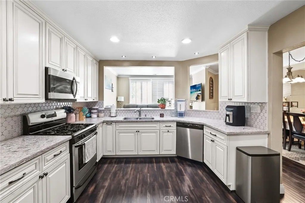 Photo of 2225 Indigo Hills Drive #3, Corona, CA 92879 (MLS # OC26042008)