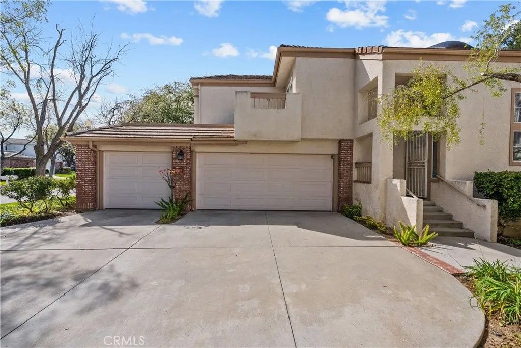 Photo of 24436 Hampton Drive #C, Valencia, CA 91355 (MLS # SR26041993)