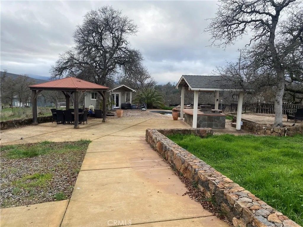 Photo of 21126 Yankee Valley, Hidden Valley Lake, CA 95467 (MLS # LC25277041)