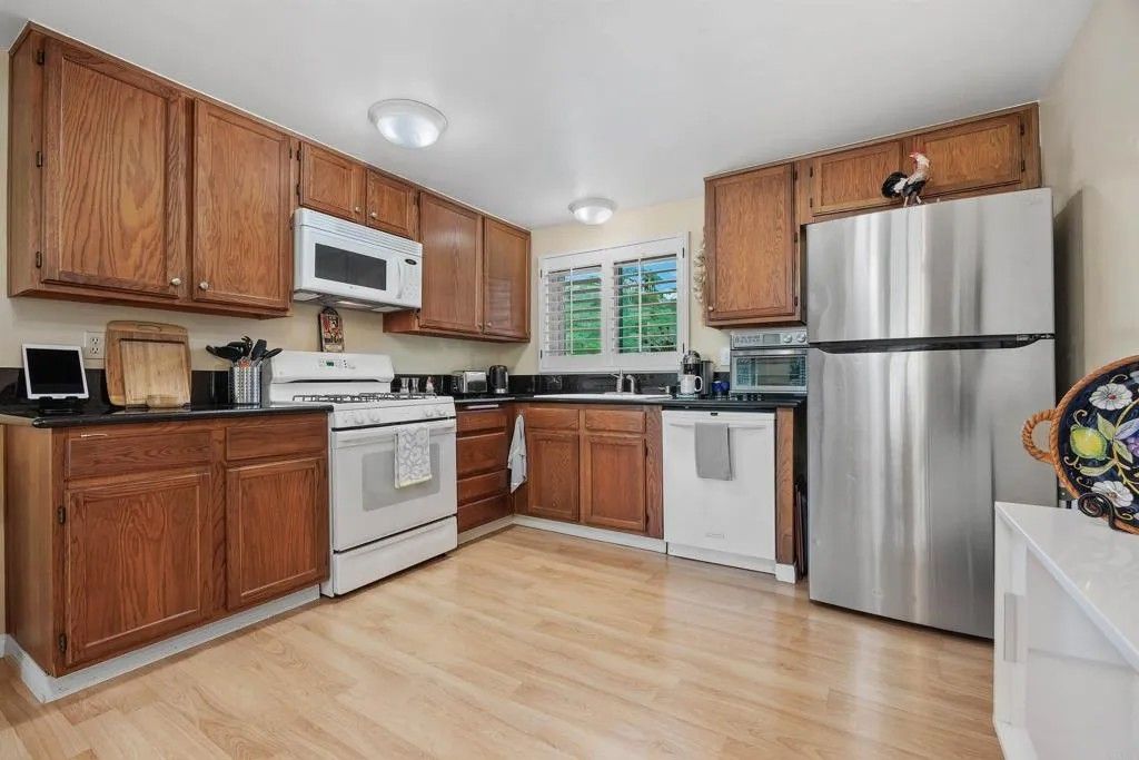 Photo of 6673 Corte Maria, Carlsbad, CA 92009 (MLS # NDP2602237)