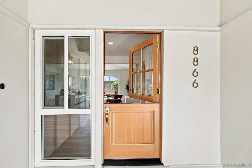 Photo of 8866 Cliffridge Ave, San Diego, CA 92037 (MLS # 260025224)