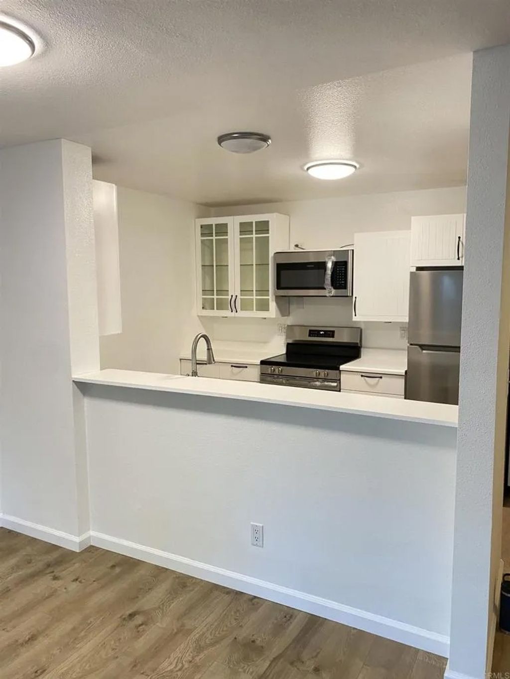 Photo of 17607 Pomerado Rd #107, San Diego, CA 92128 (MLS # NDP2600606)