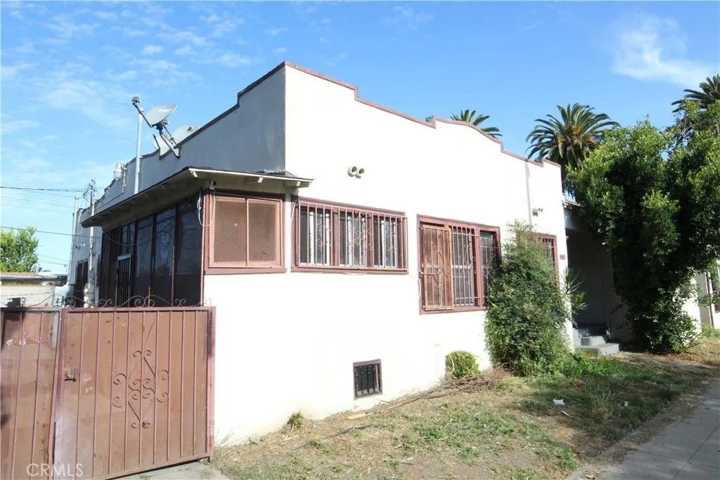 Photo of 3959 S St Andrews PL, Los Angeles, CA 90062 (MLS # PW26097481)