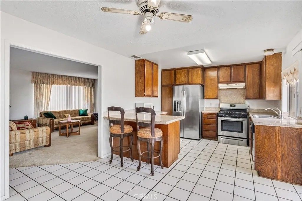 Photo of 1029 Westpark Ln, Corona, CA 92882 (MLS # OC25253778)