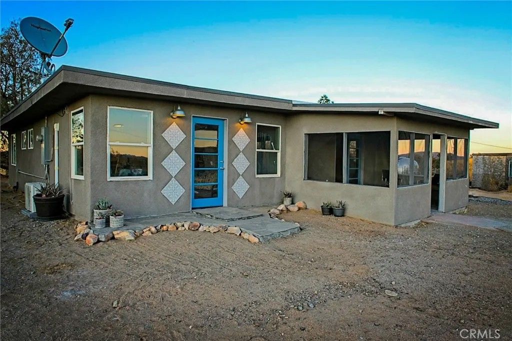 Photo of 915 Dakota Lane, Landers, CA 92285 (MLS # JT26090400)