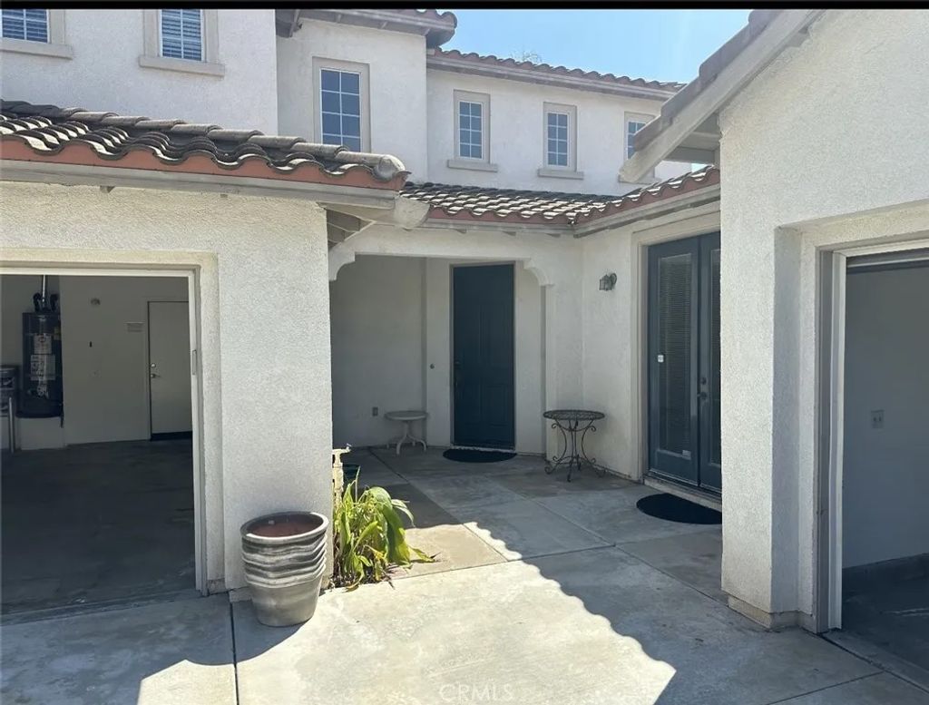 Photo of 11306 Trailstone Court, Riverside, CA 92505 (MLS # IV26013609)