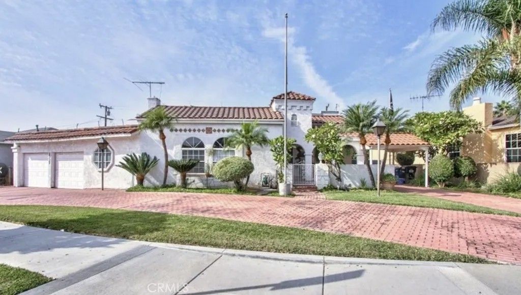 Photo of 1335 S Woods Pl, Los Angeles, CA 90022 (MLS # RS26039270)