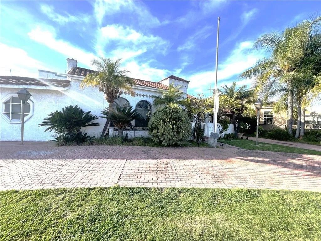 Photo of 1335 S Woods Pl, Los Angeles, CA 90022 (MLS # RS26039270)
