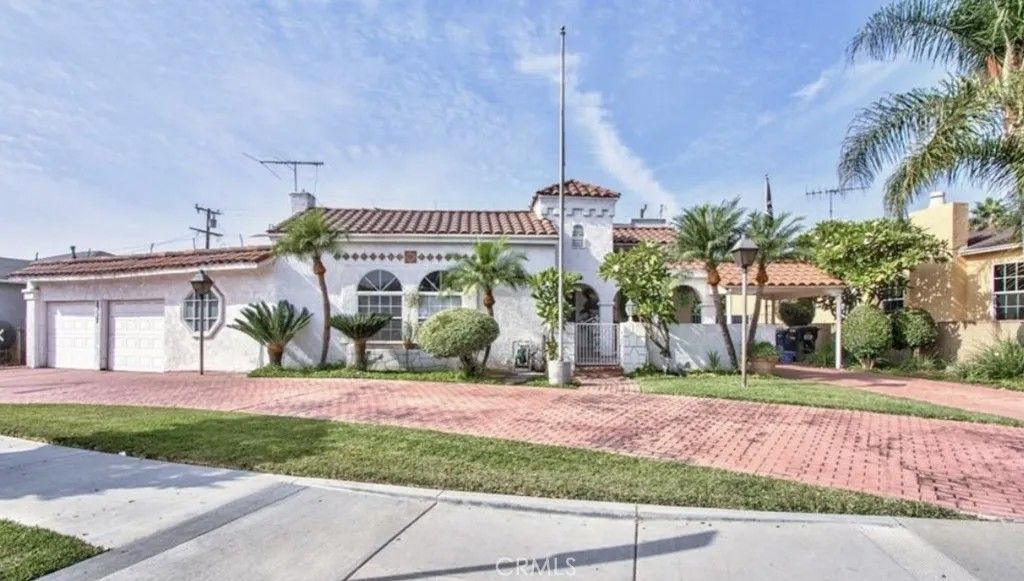 Photo of 1335 S Woods Pl, Los Angeles, CA 90022 (MLS # RS26039270)