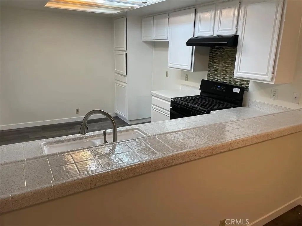 Photo of 16255 Devonshire Street #57, Granada Hills, CA 91344 (MLS # SR26026492)
