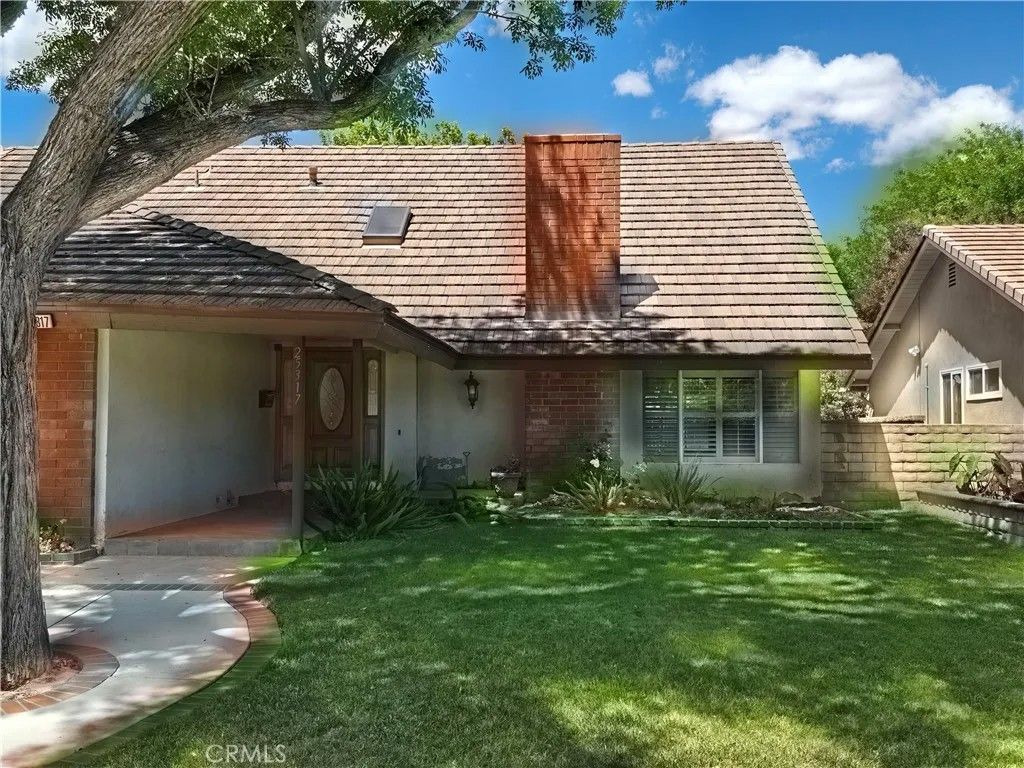 Photo of 25317 Avenida Ronada, Valencia, CA 91355 (MLS # SR26088710)