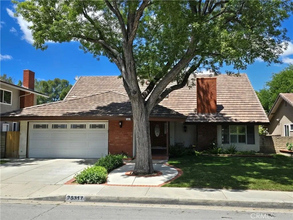 Photo of 25317 Avenida Ronada, Valencia, CA 91355 (MLS # SR26088710)