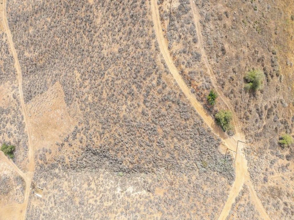 Photo of 0 Ridge, Lake Elsinore, CA 92530 (MLS # IV25138648)