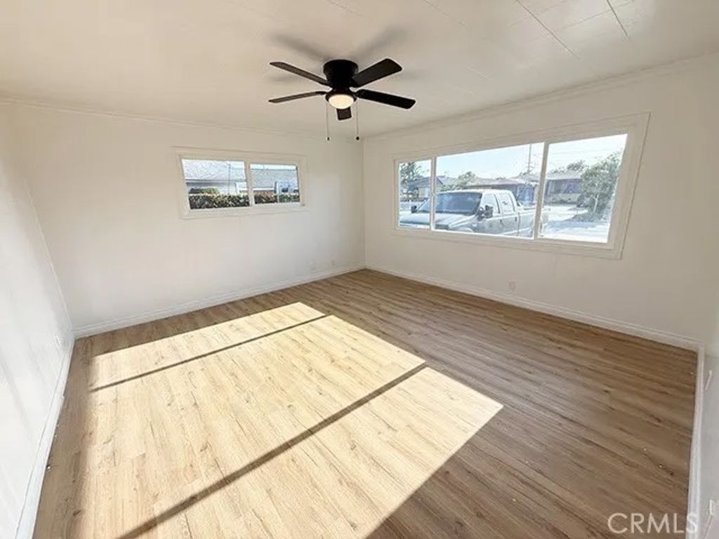 Photo of 13404 Purche Ave, Gardena, CA 90249 (MLS # SR26095424)
