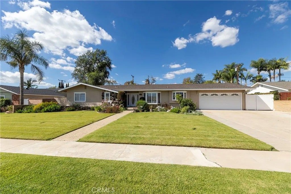 Photo of 12361 Charloma Dr, Tustin, CA 92780 (MLS # PW25242124)