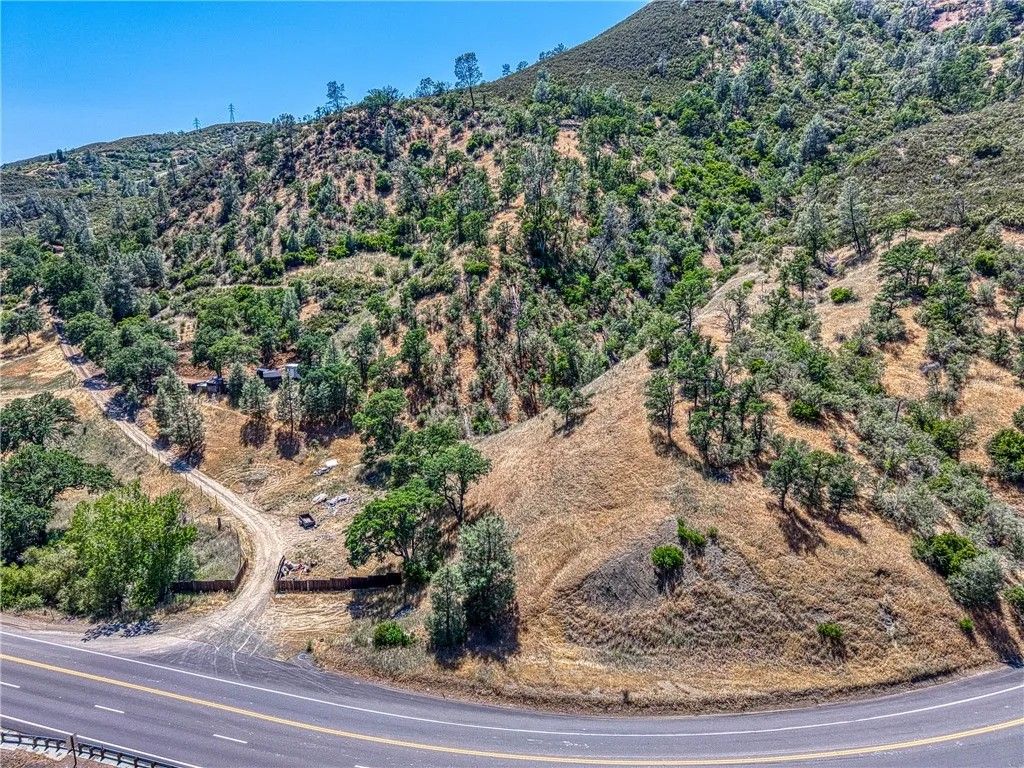 Photo of 104 Mule Skinner Rd, Clearlake Oaks, CA 95423 (MLS # LC26003243)