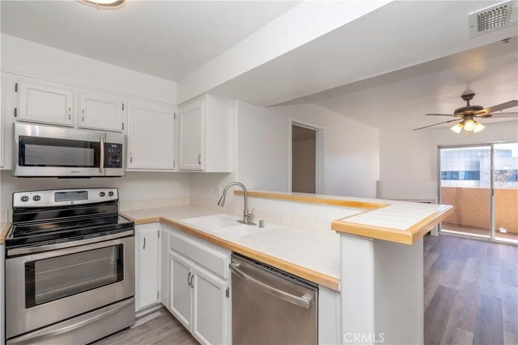 Photo of 11410 Brookshire Ave, Downey, CA 90241 (MLS # DW26020877)