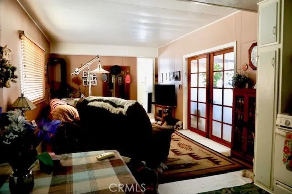 Photo of 7484 Kickapoo Trl #9, Yucca Valley, CA 92284 (MLS # HD26060711)