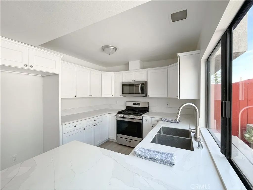 Photo of 18946 E Berrytree Ln, Orange, CA 92869 (MLS # OC26065089)