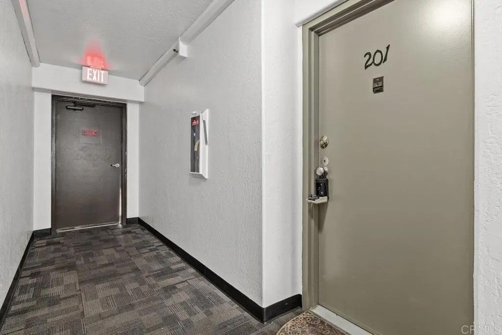 Photo of 7506 Parkway Drive #201, La Mesa, CA 91942 (MLS # PTP2602868)