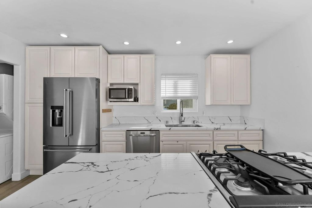 Photo of 4673 Terrace Dr #Unit B, San Diego, CA 92116 (MLS # 250045529)