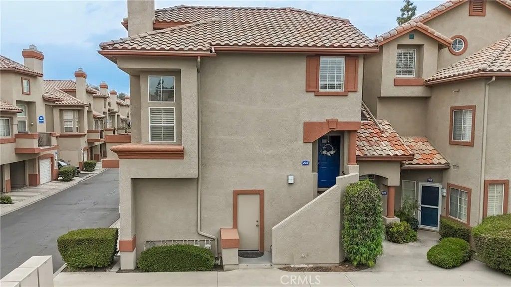 Photo of 2931 Via Milano #202, Corona, CA 92879 (MLS # CV26069847)