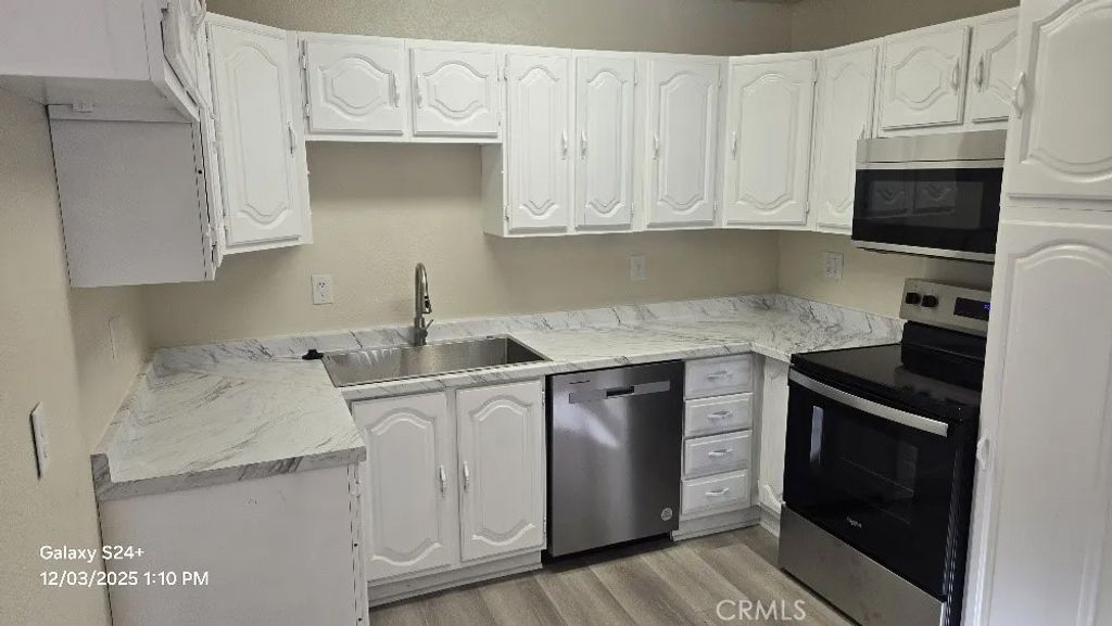 Photo of 10683 Walnut St, Los Alamitos, CA 90720 (MLS # CV25271304)