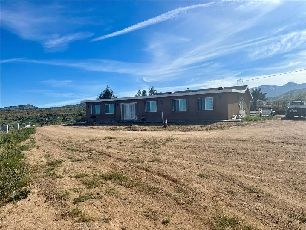 Photo of 5808 Snow Line Drive, Phelan, CA 92371 (MLS # DW26066941)