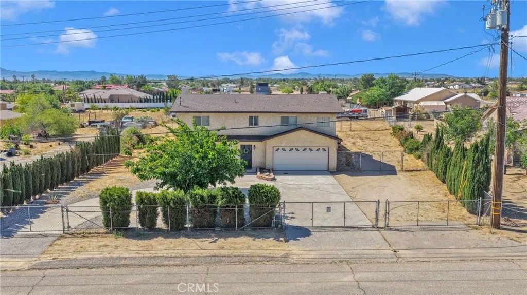 Photo of 14637 Sequoia St, Hesperia, CA 92345 (MLS # HD26087587)