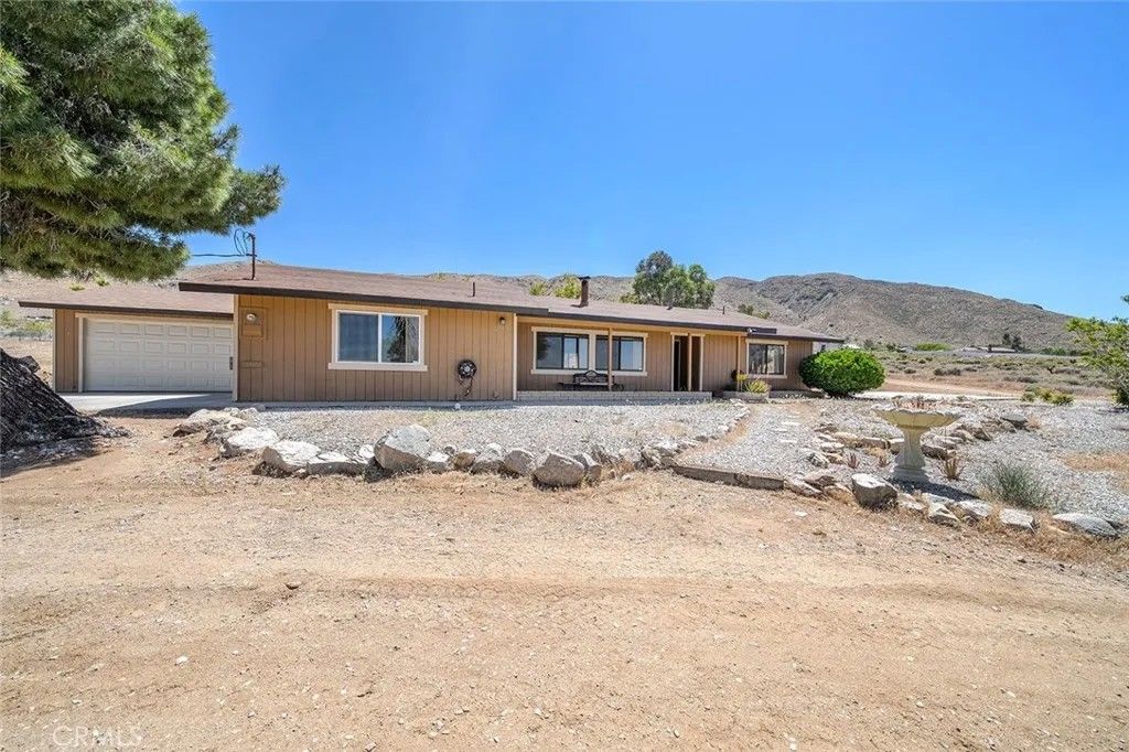 Photo of 22411 Roundup Way, Apple Valley, CA 92308 (MLS # IG26076759)