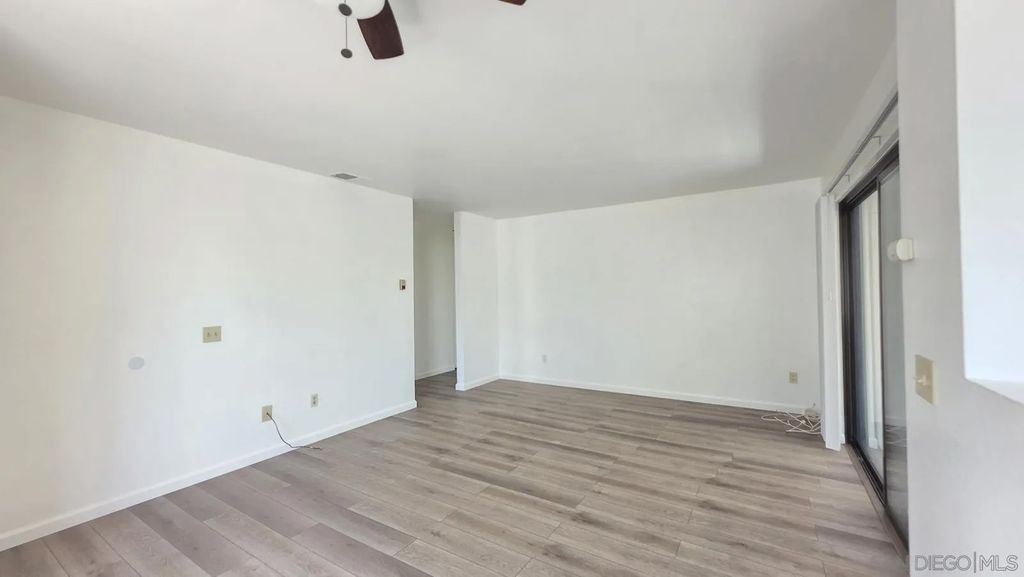 Photo of 8451 Westmore Rd #112, San Diego, CA 92126 (MLS # 260008894)