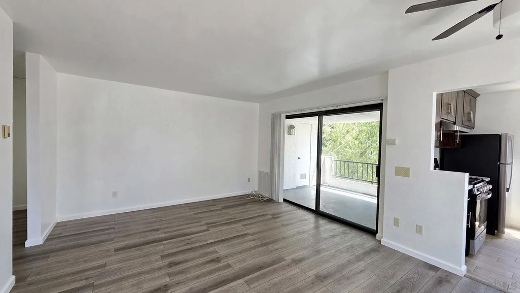 Photo of 8451 Westmore Rd #112, San Diego, CA 92126 (MLS # 260008894)